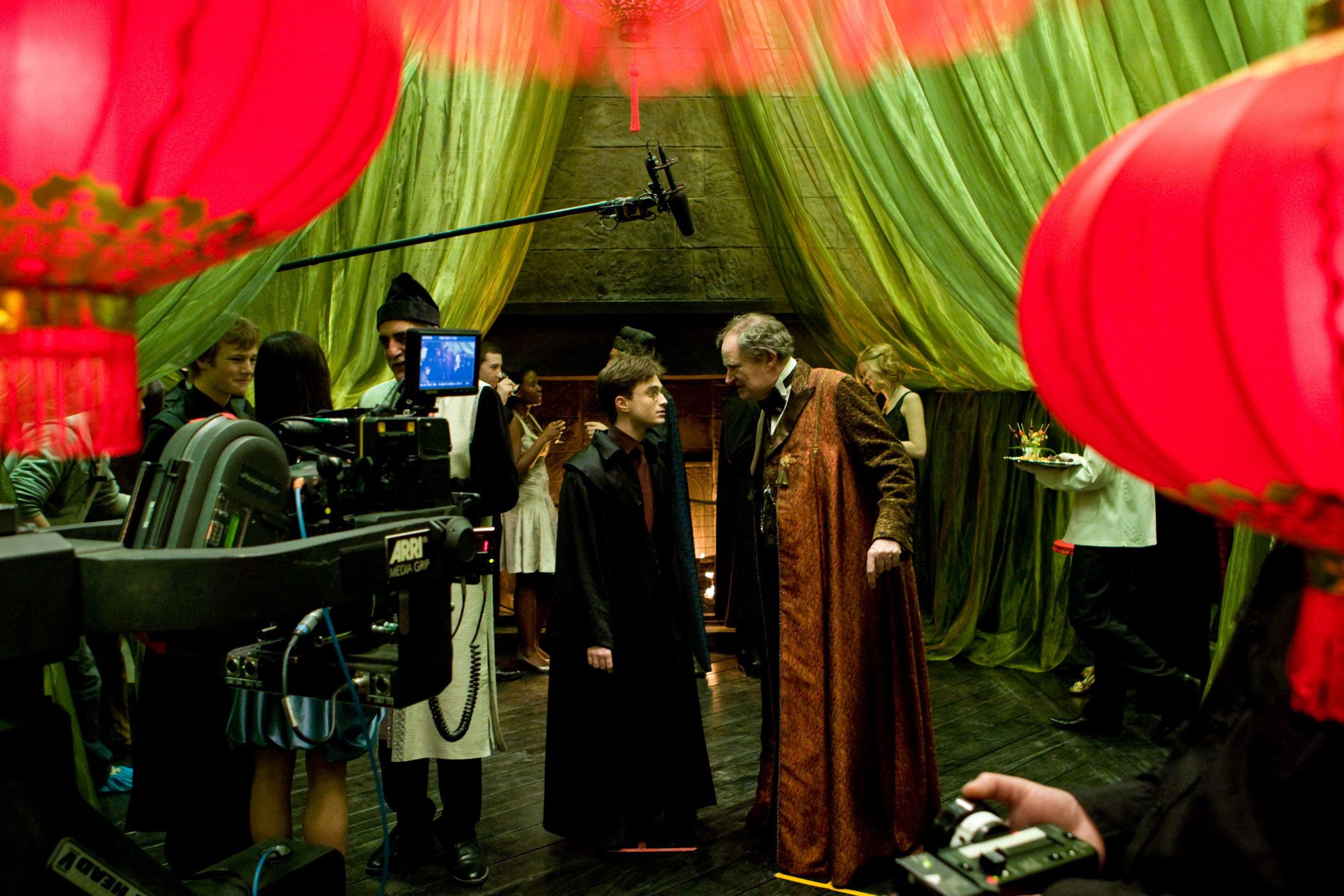 Daniel Radcliffe and Jim Broadbent on the set