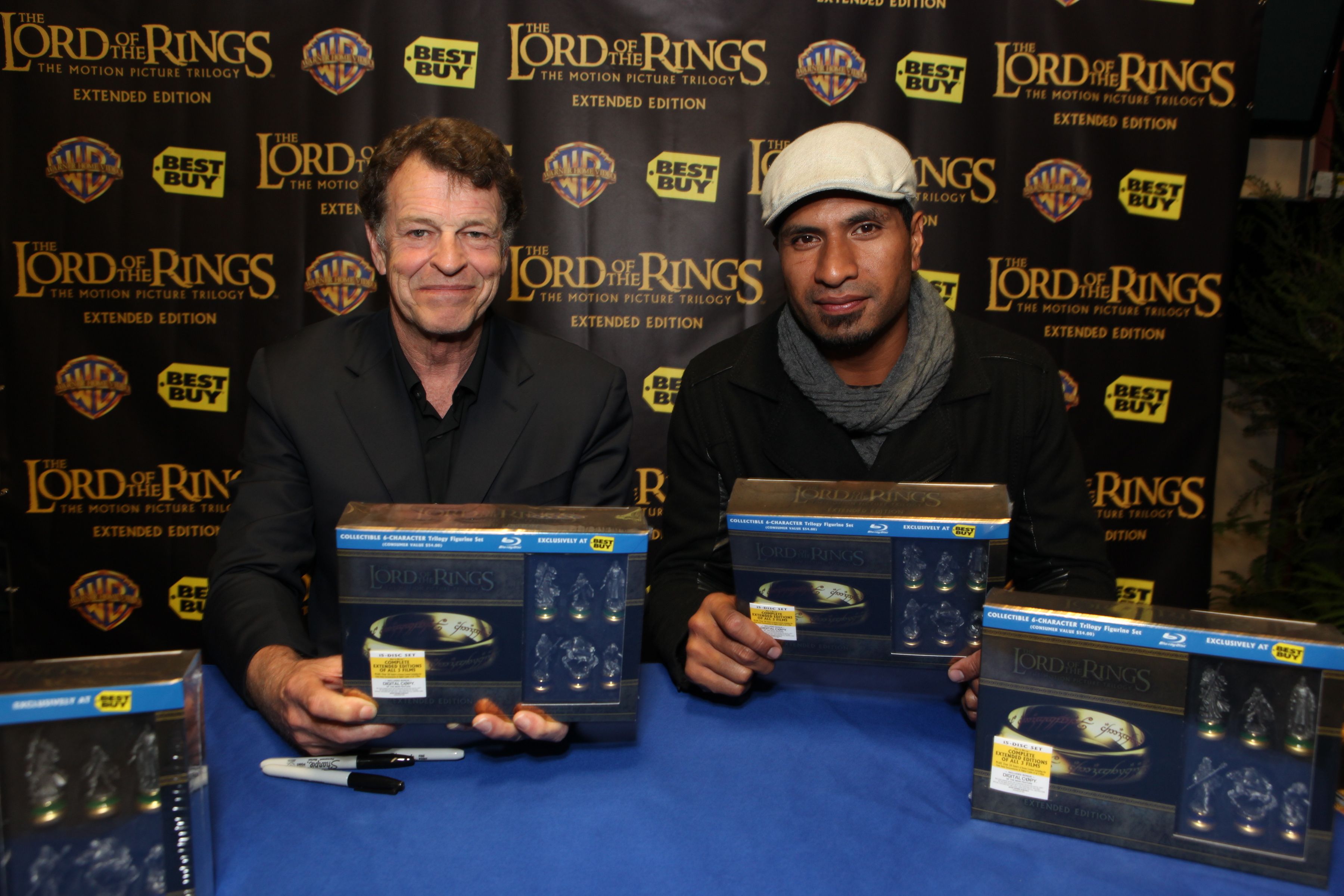 Actors John Noble and Sala Baker at The Lord of the Rings Blu-ray celebration in Los AngelesIf you were driving past the Best Buy in West Los Angeles yesterday, you might have seen a few sights you don't see every day, even in L.A. The gigantic store on Sawtelle Blvd. was transformed into Middle Earth to celebrate the midnight release of {0} Extended Edition Blu-ray release, which hits shelves June 28. I was invited to take part in the festivities, and even chat with a few cast members from the 