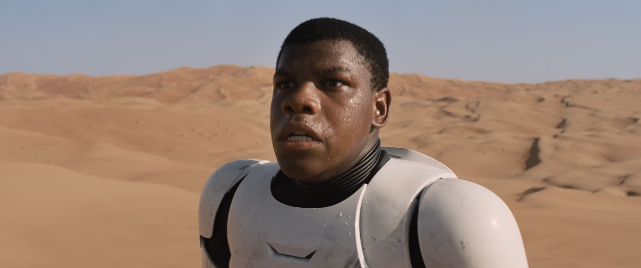 John Boyega wears the new Stormtrooper suit in Star Wars: The Force Awakens