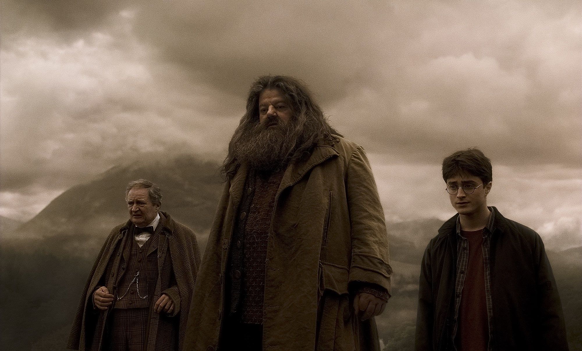 Jim Broadbent as Professor Horace Slughorn, Robbie Coltrane as Rubeus Hagrid and Daniel Radcliffe as Harry Potter