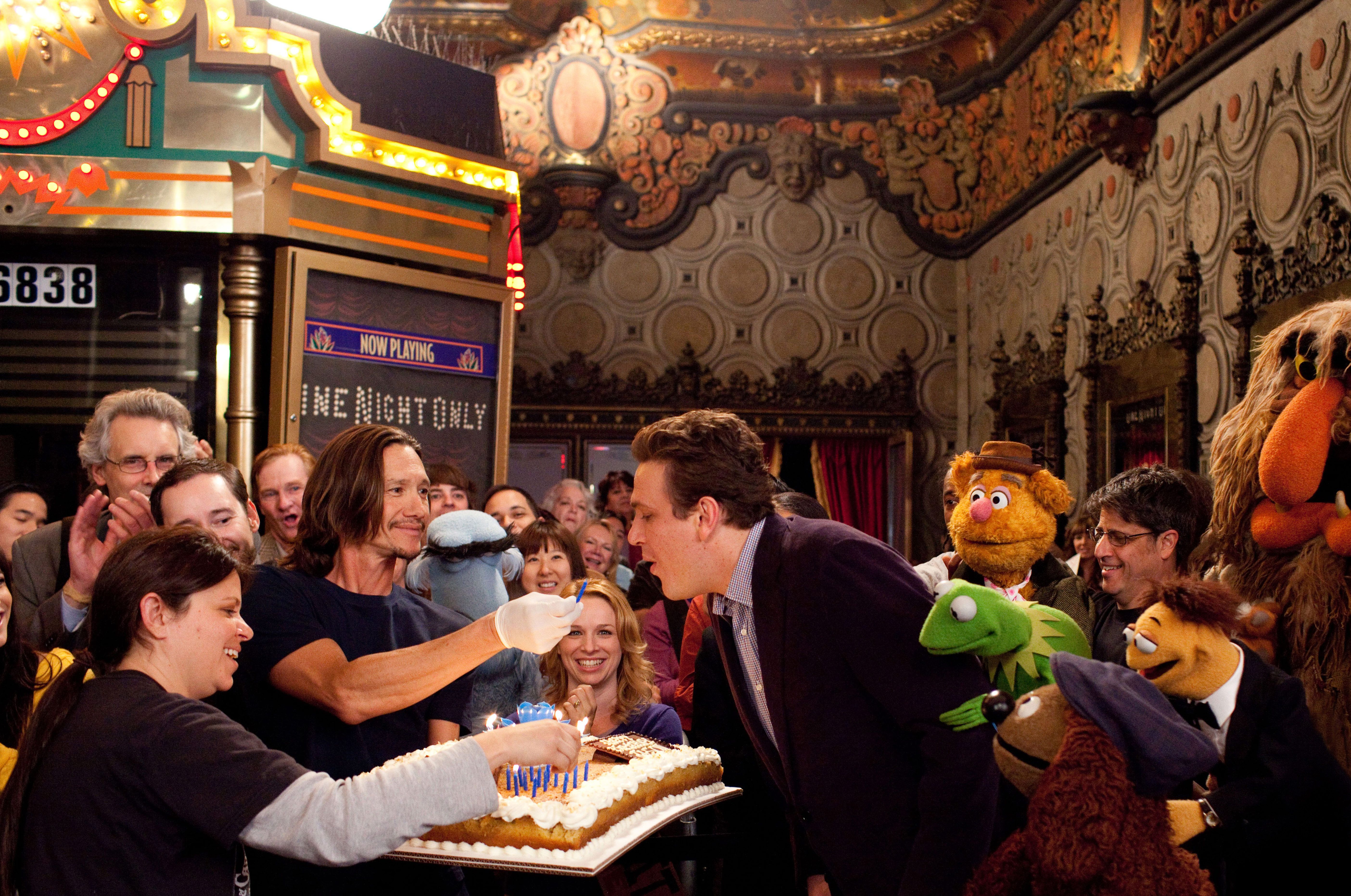 Jason Segel celebrates his birthday on the set of The MuppetsFinally, we asked {51} if she ever catches herself talking to The Muppets in between takes when the camera is not rolling. Sometimes we do, she admitted. Walter especially. I definitely talk to Walter a lot. There are some times that Walter is on remote control and they like to pretend that he has a bad attitude then because he doesn't talk back. It is a fun set. You can let your imagination run wild. I am exposing myself as the dork t