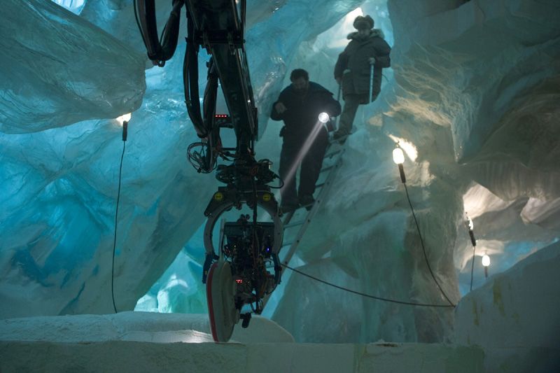 Two explorers discover an ice cave in The ThingThe actor went on to discuss working with the film's director {47}. I really love him. For starters, handing this project over to anybody would have been tricky. I think you need to have someone who's really passionate about it. In a way, I think you need to have someone who has been a fan of the old movie and he's a fan of that kind of genre of film. I know that he really loves the original {48} and he really loves the original {49}. So his kind of