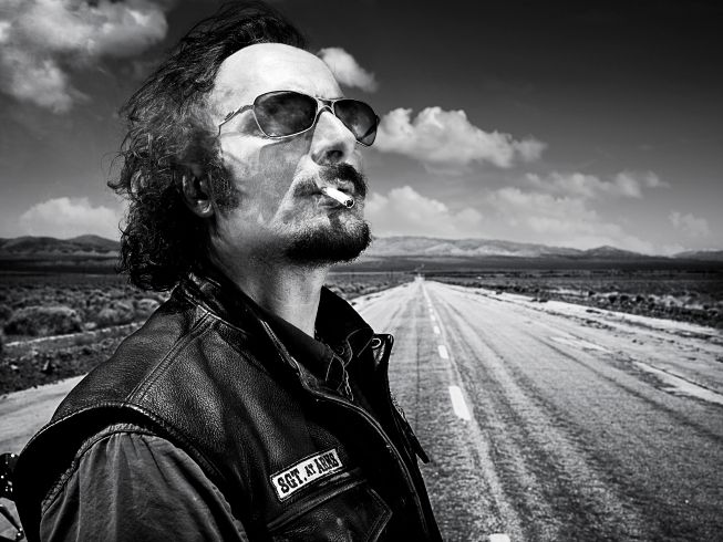 Kim Coates stars as Alex 'Tig' Trager in Sons of AnarchySince {27} was a writer-producer on {28}, he was asked if there could be a possibility of bringing in {29} to guest-star on {30}, and he revealed that another alum of {31} would be returning to the show this season, Kenny Johnson, who played Curtis Lemansky on {32}: