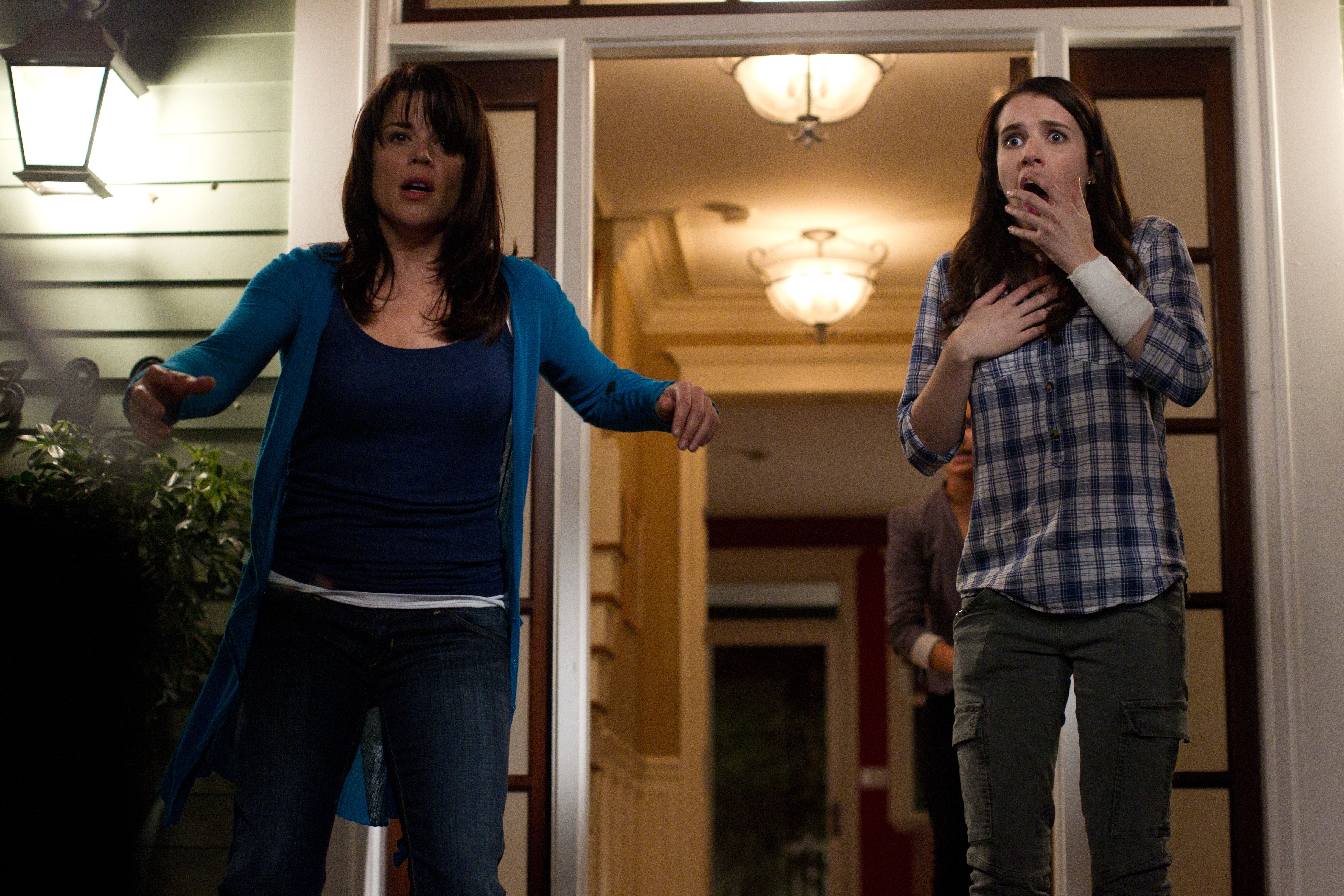 Neve Campbell and Emma Roberts in Scream 4