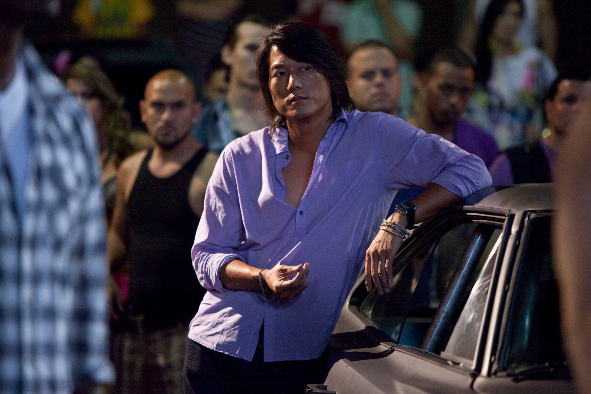 Sung Kang stars as Han{63} explained that in the film, Brian brings his character in to help with the job that the group is working on, because he knows him from when they were in Miami. But they haven't seen each other since the events of that film. We followed up by asking the actor what role Tej plays on the team? Okay in 2 Fast 2 Furious my character was basically all about his money. He was always betting, trying to make five dollars out of one, and he's basically doing the same thing here.