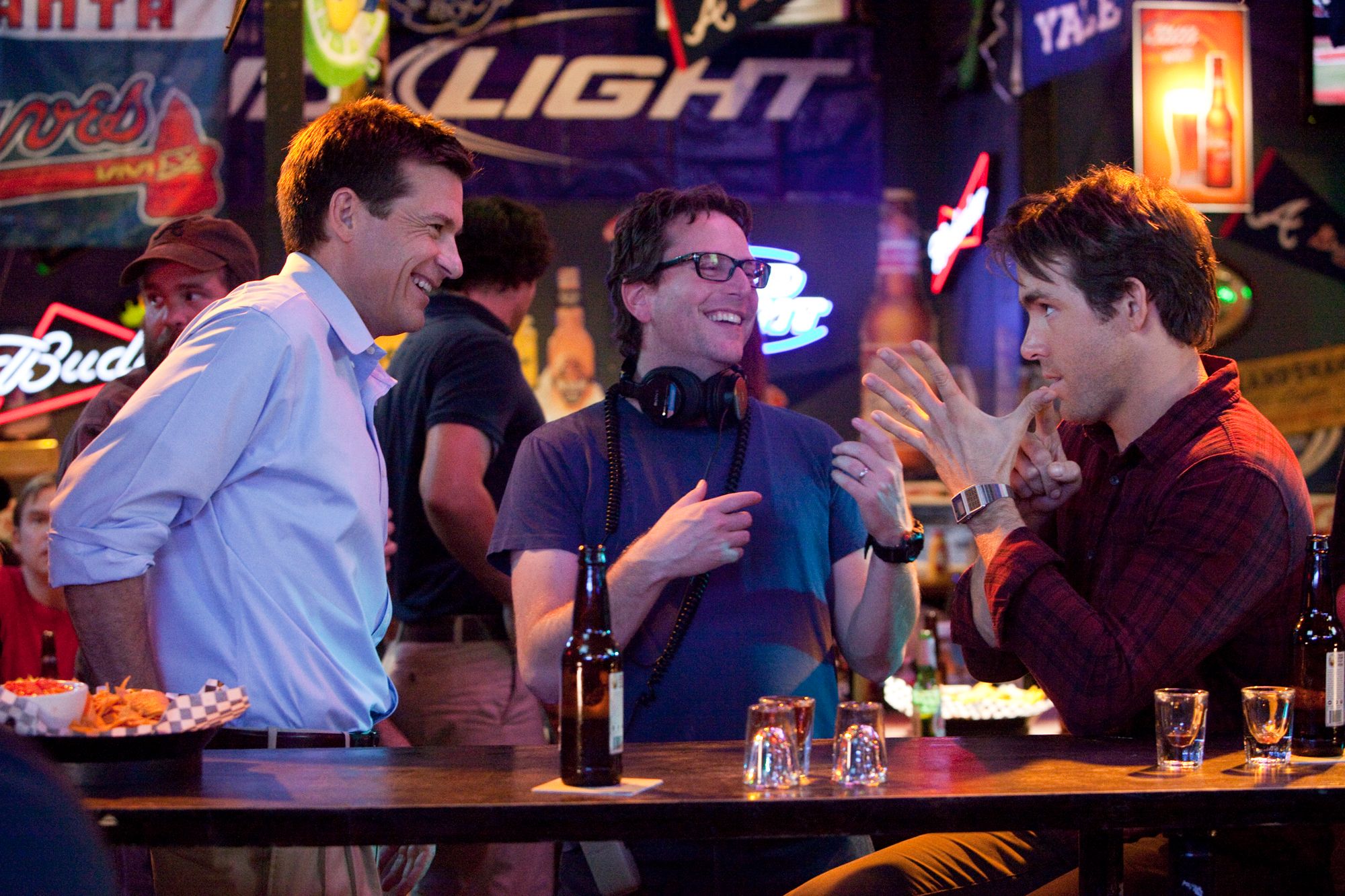 Jason Bateman and Ryan Reynolds with director David Dobkin on the set{87} You talk to David, and he says this much more eloquently but I'm paraphrasing what he said. He loves scripts that have big broad, relatable set pieces but they're executed in a sophisticated manner. That's possibly a great formula for the kind of comedy I like.