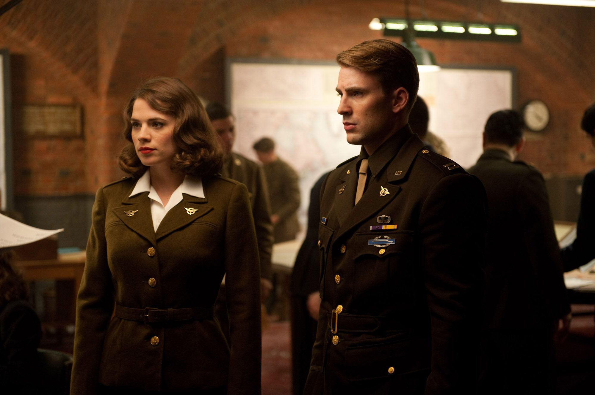 Hayley Atwell and Chris Evans in full military uniform