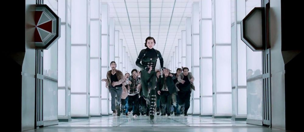 Alice escapes from a horde of zombies in Resident Evil: Retribution{53} You know, Alice started off as the audience, as this innocent bystander watching what's going on and then finally understanding what role she had to play in all of it and who she was. And then throughout the series, she kinda started separating from people. You know, first she realized Umbrella was controlling her, so she couldn't be close to people. Now that she's human again, and not only human again, but now she's almost.