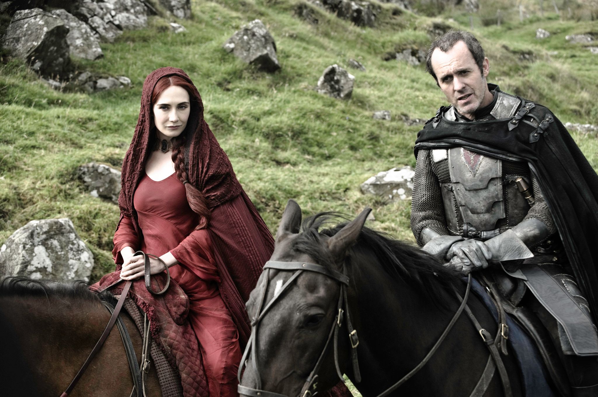 Carice van Houten as Melisandre and Stephen Dillane as Stannis Baratheon in Game of ThronesThere are also some very intriguing developments with young Arya ({12}) in this episode. For one, there are a few scenes where she is seen reciting names of the royal court at King's Landing, for no apparent reason. It seems her boyish disguise isn't really fooling anyone, though, as Tywin Lannister ({13}) reveals her true gender, which could lead to some very interesting things... if he ever discovers wha