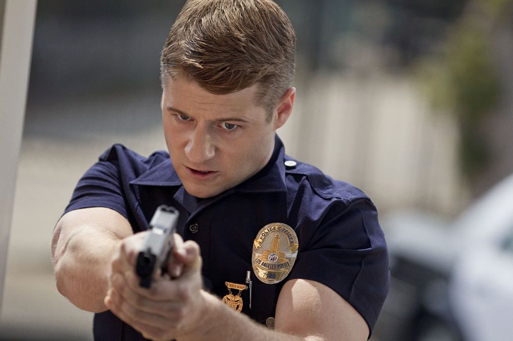 Ben McKenzie stars as Officer Ben ShermanBefore leaving the set, we had an opportunity to meet with retired LAPD officer {33}, who is an advisor on the show. {34} had laid out on a table for us all of the actual weapons that are used on the show. These are real, LAPD standard weapons that are featured on the series and on the table before us were several handguns, a shotgun, a beanbag shotgun, batons, handcuffs and a taser gun. {35} agreed that one of the most difficult police procedures to repl