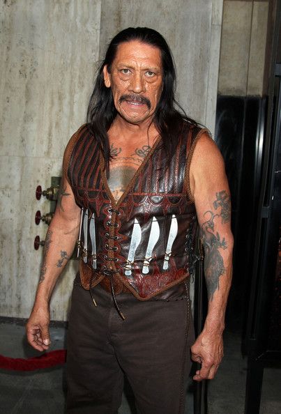 Danny Trejo at the Machete L.A. PremiereLet the revolution begin ... the {0} revolution! Hot on the heels of restoring the {1} franchise to its gory glory with this summer's hit film {2}, the legendary independent director returns with the long awaited feature film version of his popular short, which appeared in his and {3}'s combined directorial effort, {4}. {5}, which opens on September 3rd stars {6} ({7}) in the title role as a renegade former Mexican police officer looking for justice after 