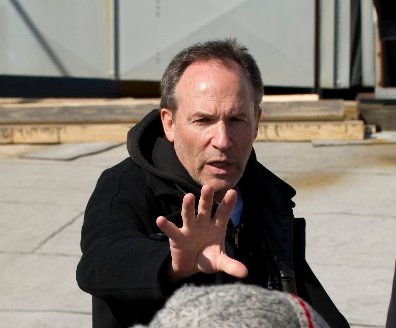 Director Matthew Chapman on the set of The Ledge