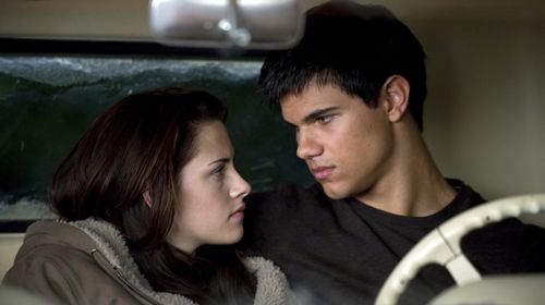 A smitten Jacob (Taylor Lautner) trying to comfort Bella (Kristen Stewart), who mourns Edward's abrupt departure