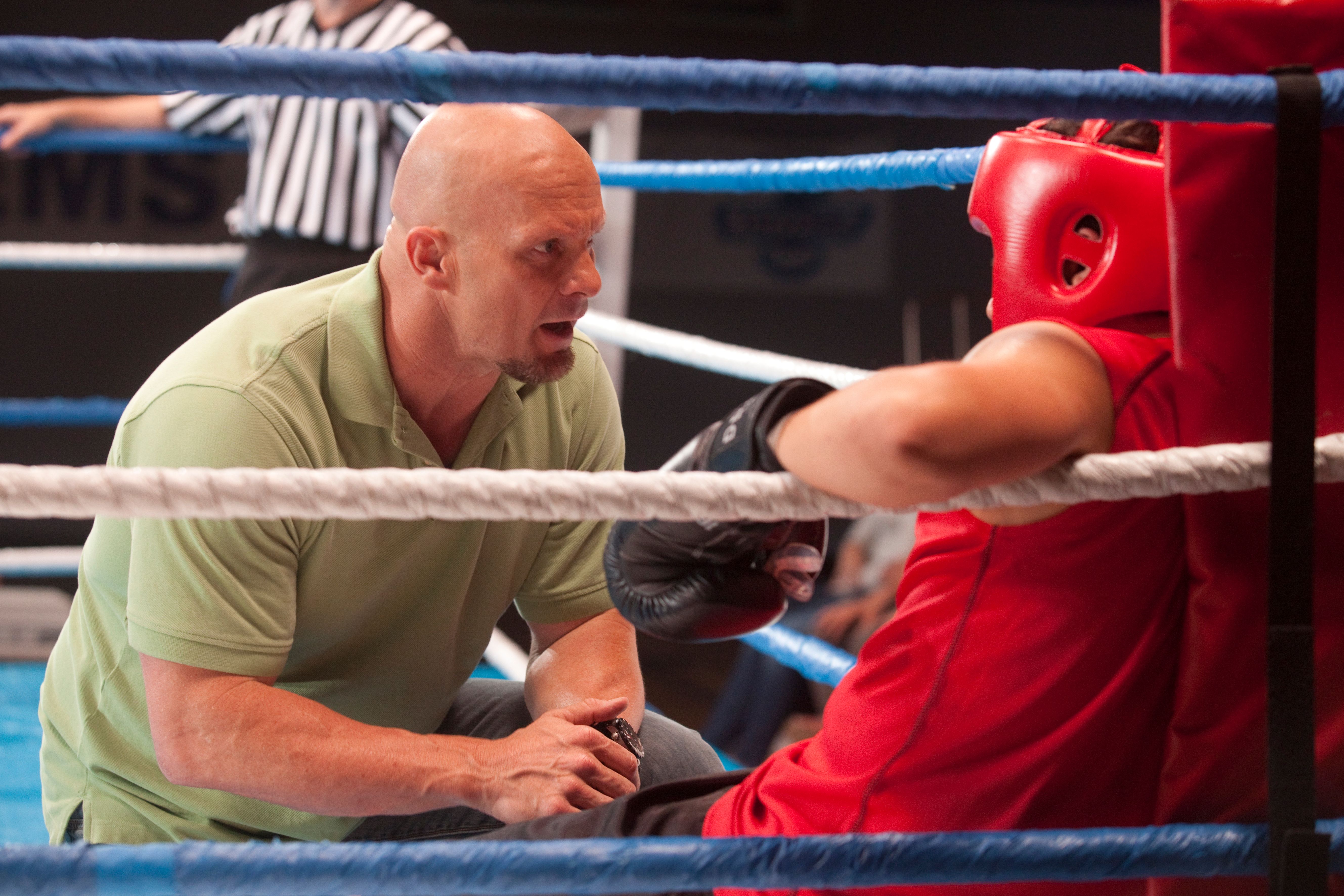 Steve Austin coaches Jaren Brandt Bartlett in Knock Out{29}: I actually watched that beforehand. Because I wanted to see how similar my idea was. I will be honest, my movie is basically {30}. There are some changes. It takes place in a school. It's boxing. The thing is, I work with kids that have autism. It's incredible, once you rally get into it, and find out what that is. The more I worked with these kids, the more I realized that they really respond to movie references. I would say something