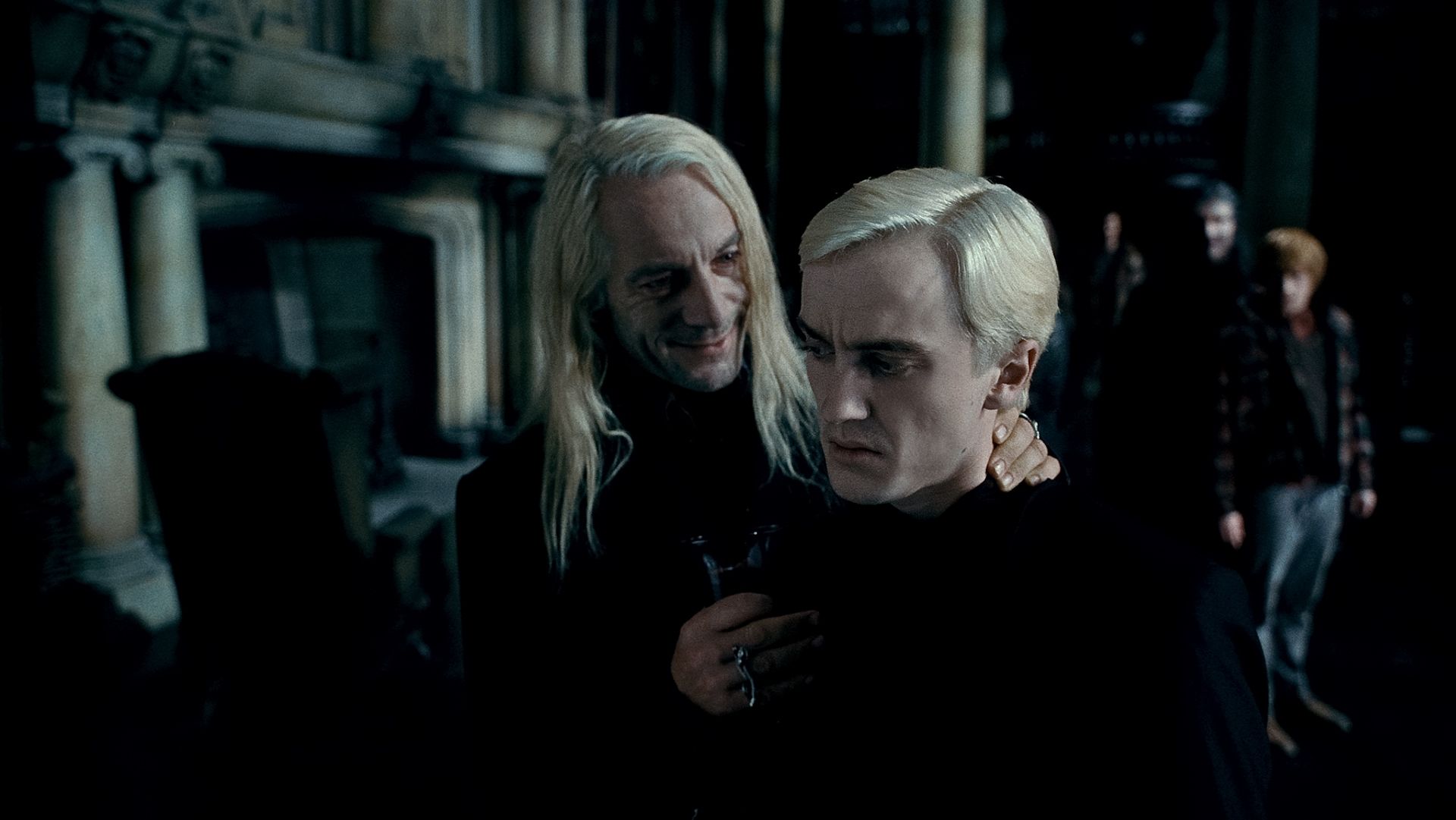 Jason Isaacs and Tom Felton as Lucius and Draco Malfoy