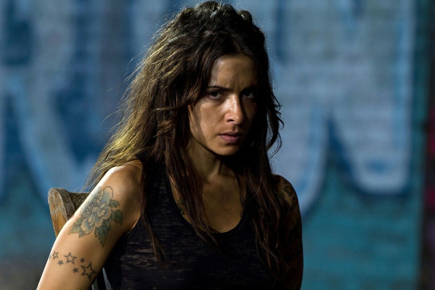 Sarah Shahi stars as Lisa, the daughter of Sylvester Stallone's Jimmy in Bullet to the Head <blockquote class=
